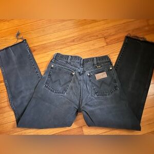 Faded black wrangler jeans